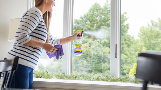 How do I remove adhesive residue from glass?