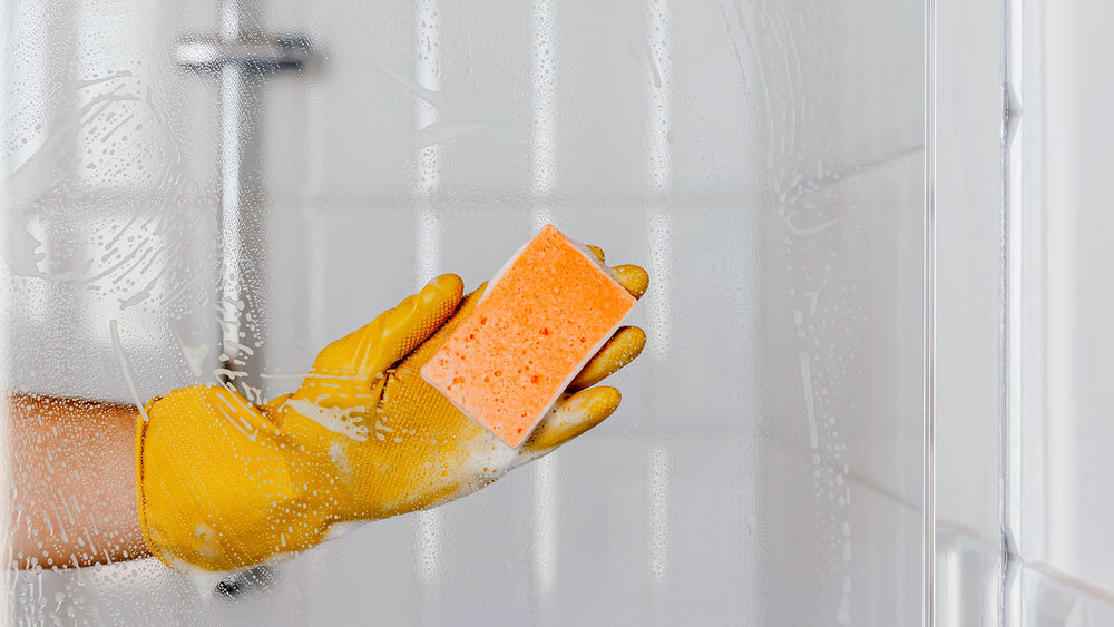 Why You Should Try Cleaning Your Shower With A Dryer Sheet